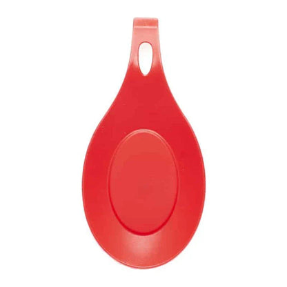 Heat-resistant silicone spoon mats in various colors protecting a kitchen counter from hot cookware