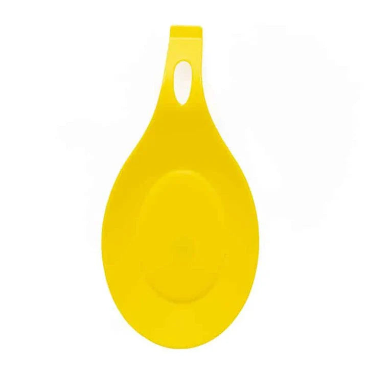 Heat-resistant silicone spoon mats in various colors protecting a kitchen counter from hot cookware