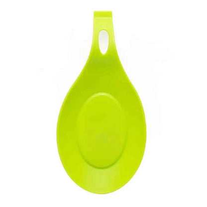 Heat-resistant silicone spoon mats in various colors protecting a kitchen counter from hot cookware