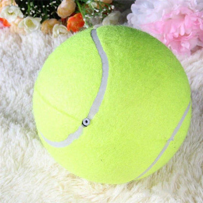 A giant-sized rubber tennis ball toy for dogs, designed to withstand enthusiastic play and promote dental health.