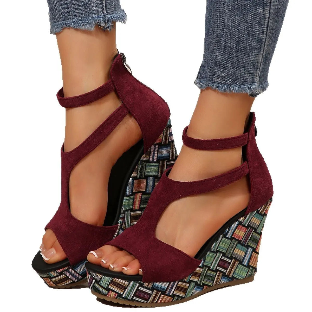 Women's thick-soled ankle-strap buckle sandals in cream white, showing cloth upper and rubber sole.