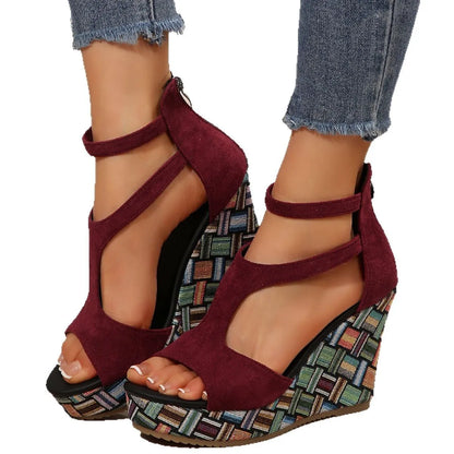 Women's thick-soled ankle-strap buckle sandals in cream white, showing cloth upper and rubber sole.