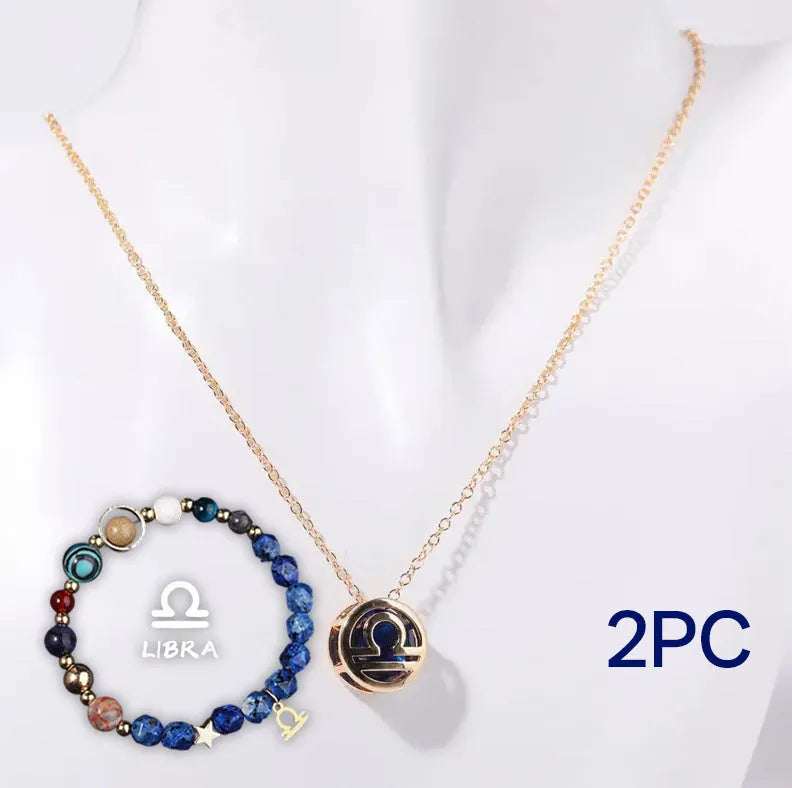 A natural stone beaded necklace and matching adjustable bracelet laid flat.