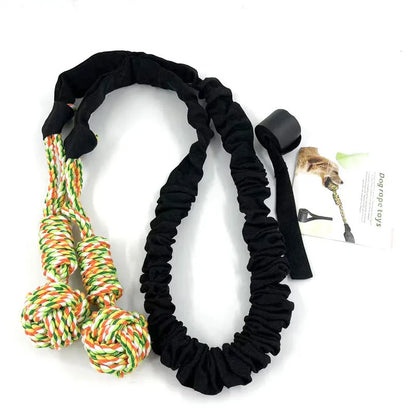 Braided cotton rope dog toy in red colour, approximately 30 cm long, for tug-of-war and dental health