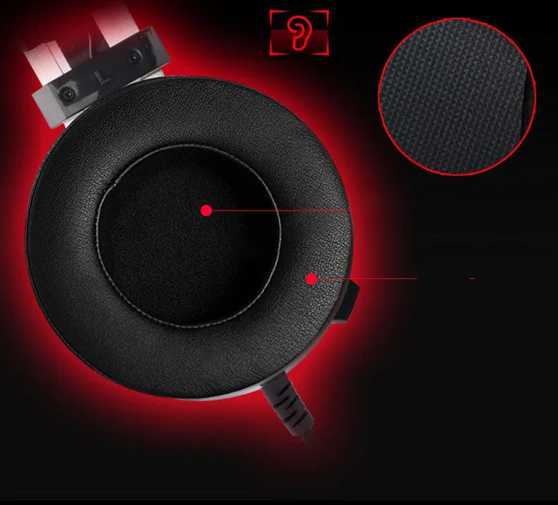 Black wired PC gaming headset with over-ear cups and a 3.5mm audio jack.
