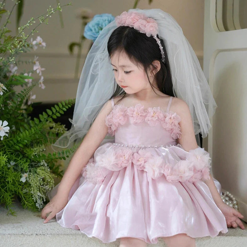 Pink polyester flower girl wedding pettiskirt with princess design, shown on mannequin