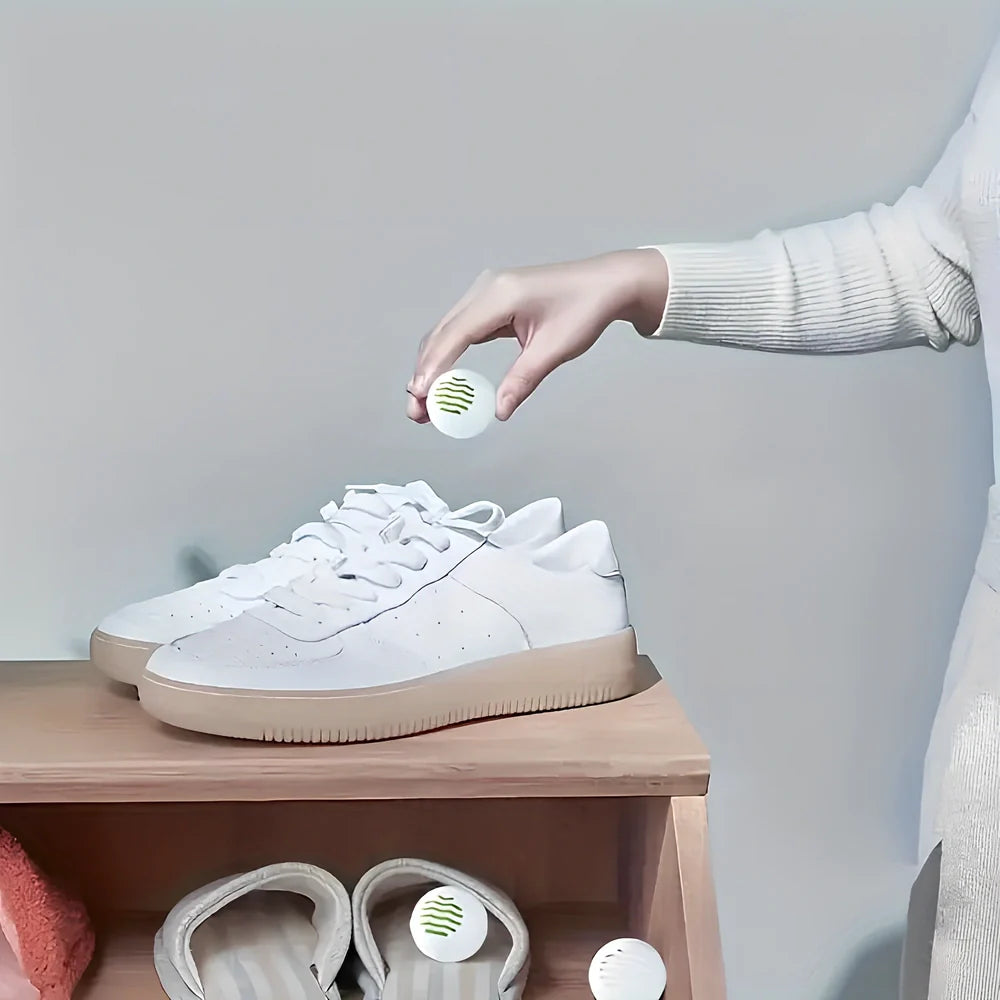 White shoe deodorant balls with green tea scent for 30-day odour elimination in footwear