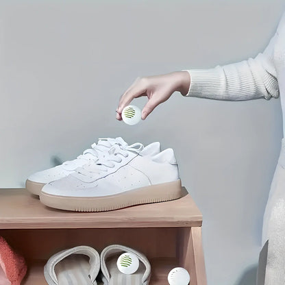 White shoe deodorant balls with green tea scent for 30-day odour elimination in footwear