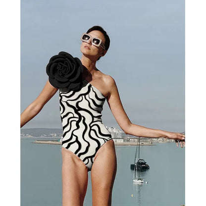 One-piece swimsuit with three-dimensional flower pattern in European and American fit.