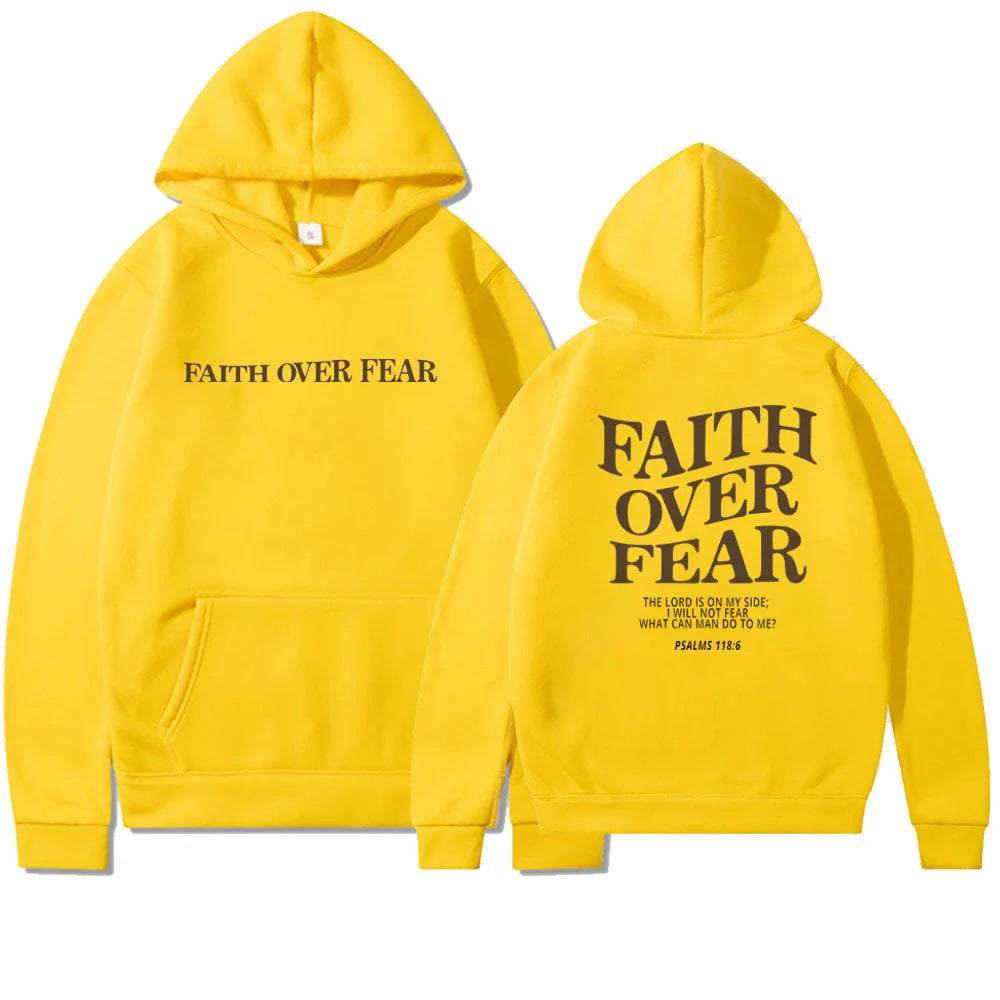 A stylish Christian hoodie with inspirational graphics and a message of faith over fear