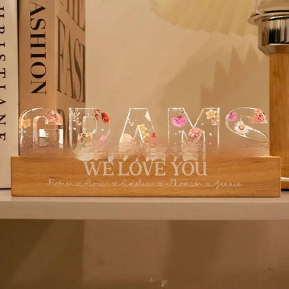 Custom flower printed LED night light with personalised text on acrylic surface in three size options