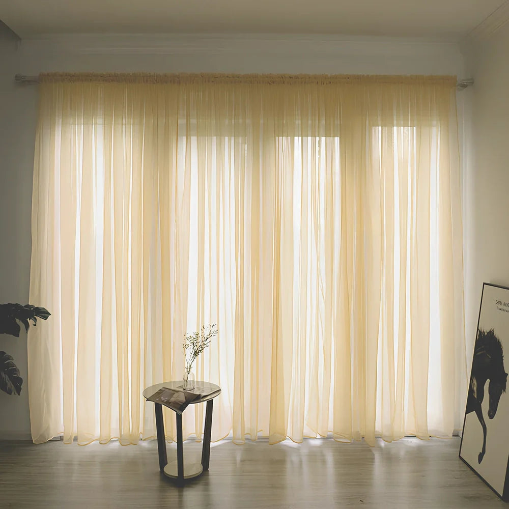 Simple modern balcony solid colour gauze curtain in beige showing light transmission effect