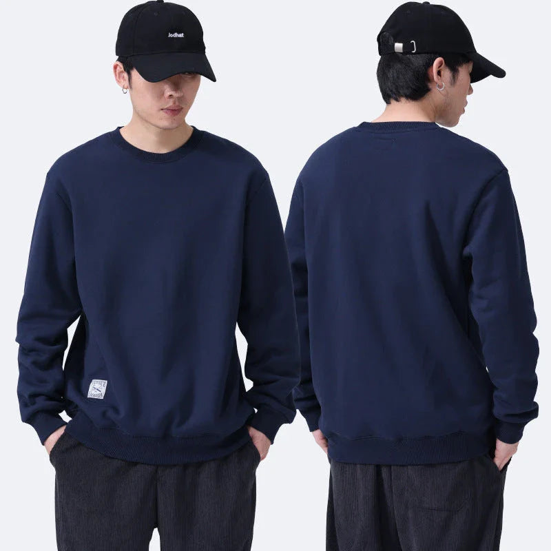 Cozy fleece pullover in a variety of classic colors, featuring a warm and soft fabric blend, stylish round neck design, and comfortable long sleeves.