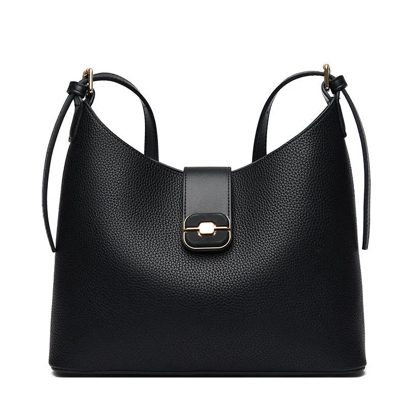 PU bucket shoulder bag in biscuit colour showing internal phone compartment and zippered sections