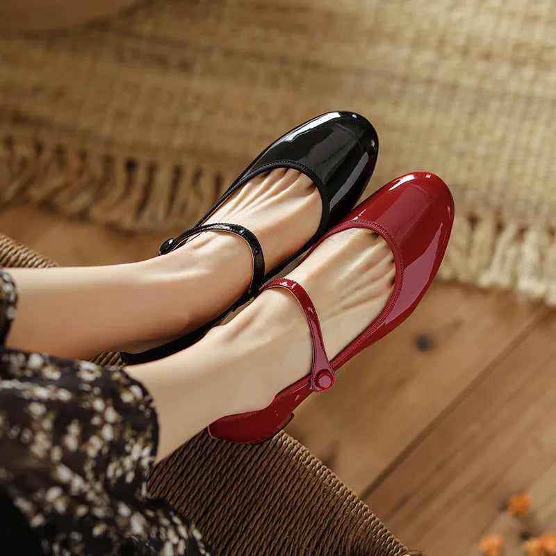 Women's chunky heel retro round head pumps with ankle-strap buckle, two-layer cowhide upper, rubber sole, red or black, sizes 35-39