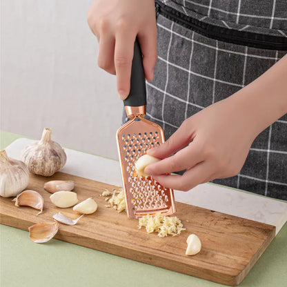 Rose gold stainless steel kitchen tool set with copper accents including peeler and utensils in six colour options