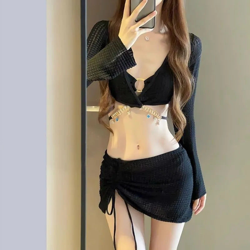 Women's long sleeve black and white bikini swimsuit with split design for hot spring swimming