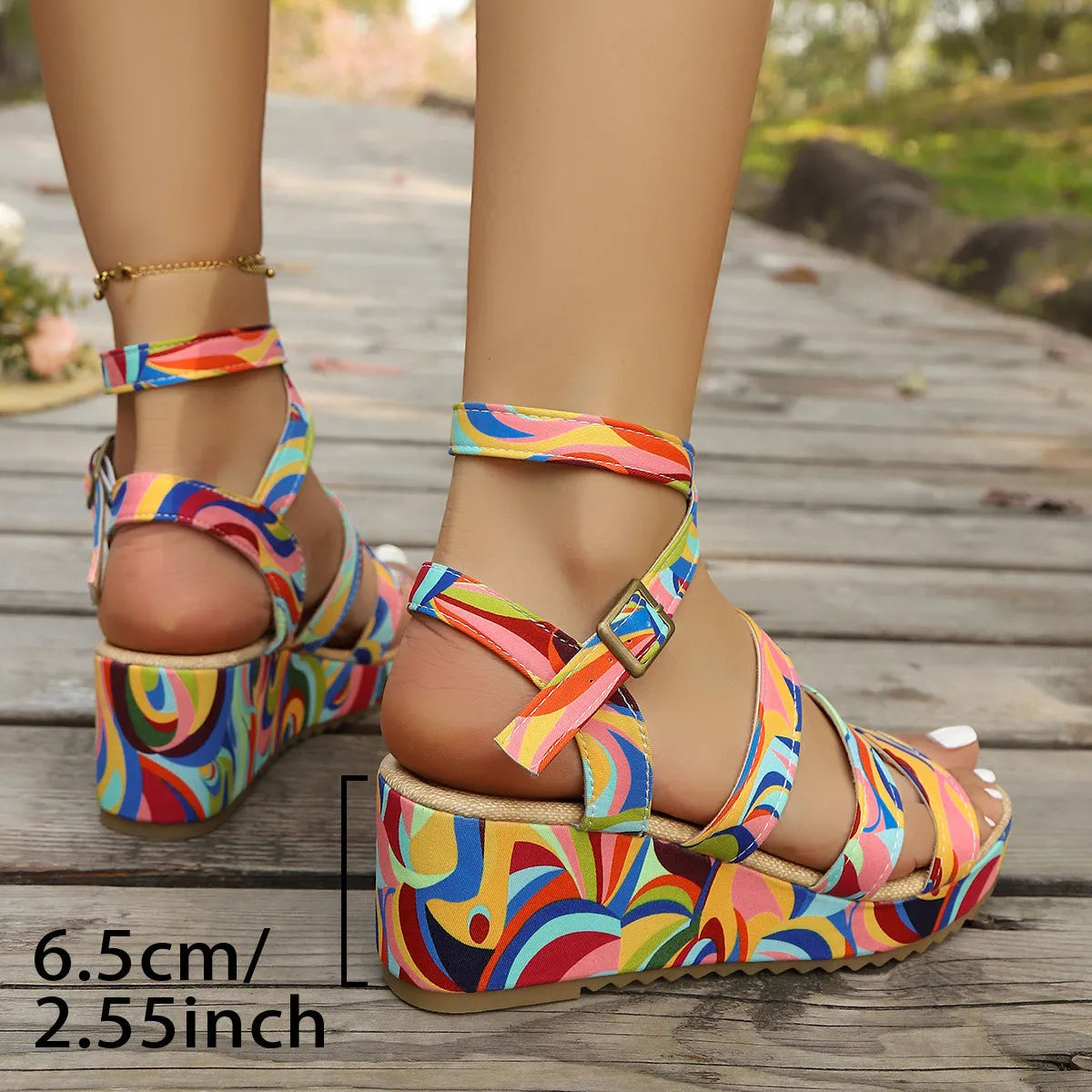 Women's buckle strap wedge sandals with fish mouth toe opening and a lightweight PU upper.