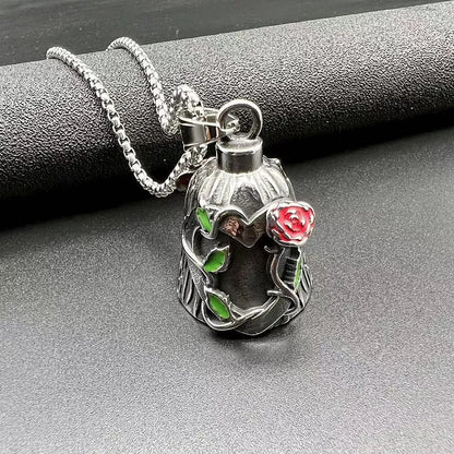 Polished titanium steel motorcycle lucky bell with a red epoxy rose design visible on both sides.