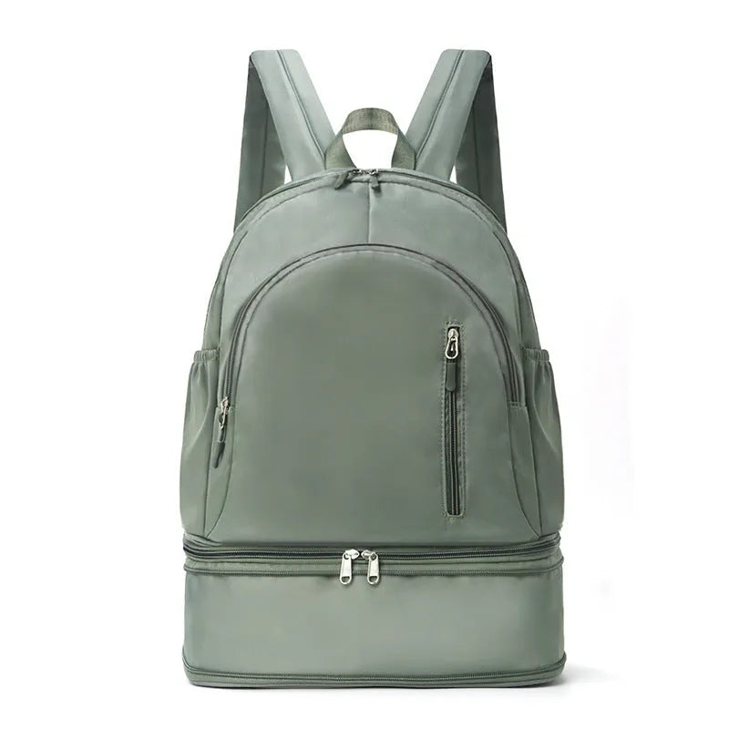 Women's casual backpack in black with adjustable curved shoulder straps and contrast stitching, 20-35L waterproof polyester.
