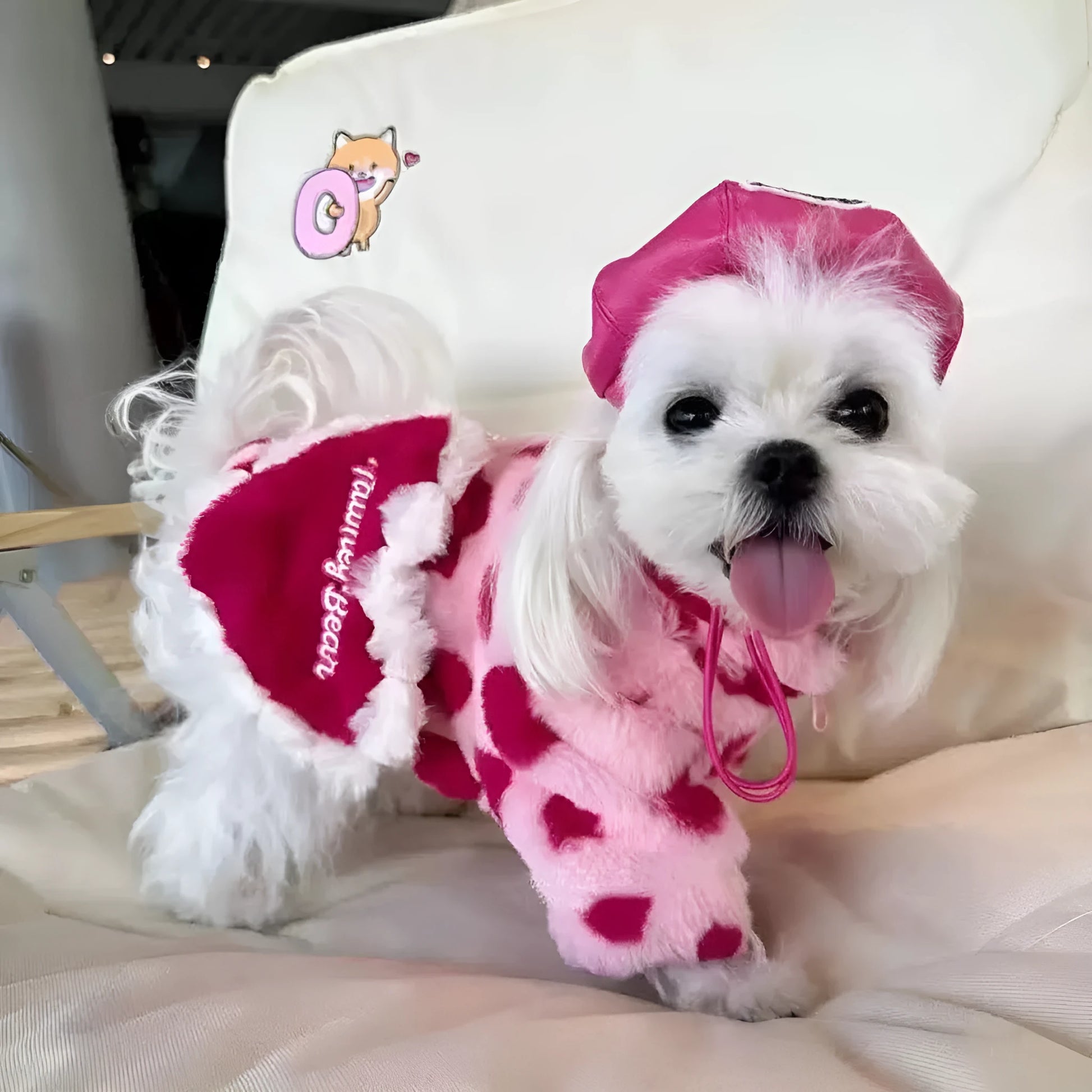 Polyester plush coat for small dogs in British style with fleece lining, shown in pink colour