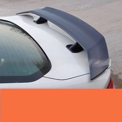Car punch-free spoiler in ABS plastic showing adhesive mounting surface and finish options