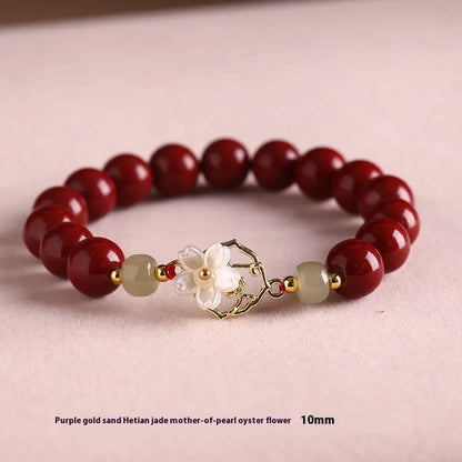 Handcrafted Hetian Jade New Chinese style bracelet in cinnabar with white butterfly, lotus and bells of Ireland motifs