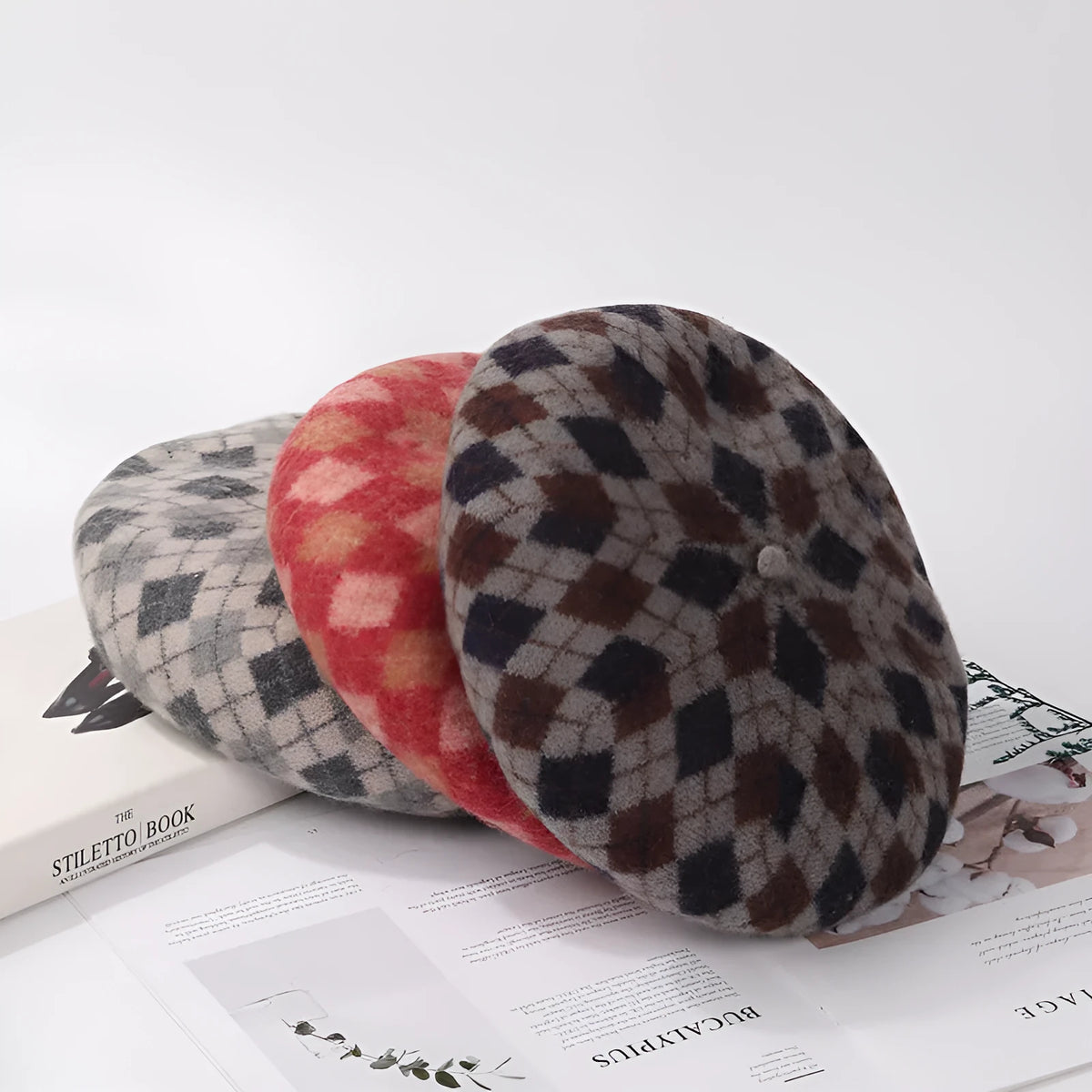 Wool plaid beret with dome crown, adjustable size, and tassel and mesh detail in blue light coffee plaid.