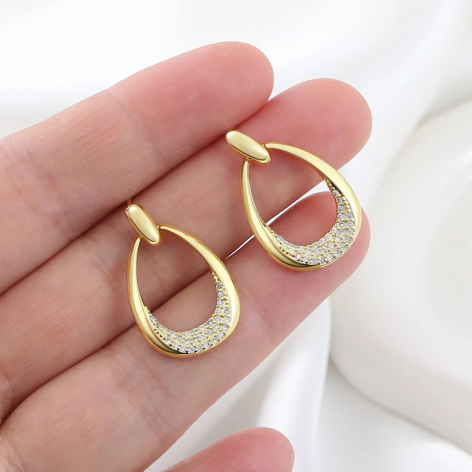 Women's yellow gold geometric drop earrings with zircon detailing measuring 2.6 by 1.7 centimetres