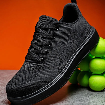 Pair of light white thick-soled casual sneakers with mesh upper and lace-up front.