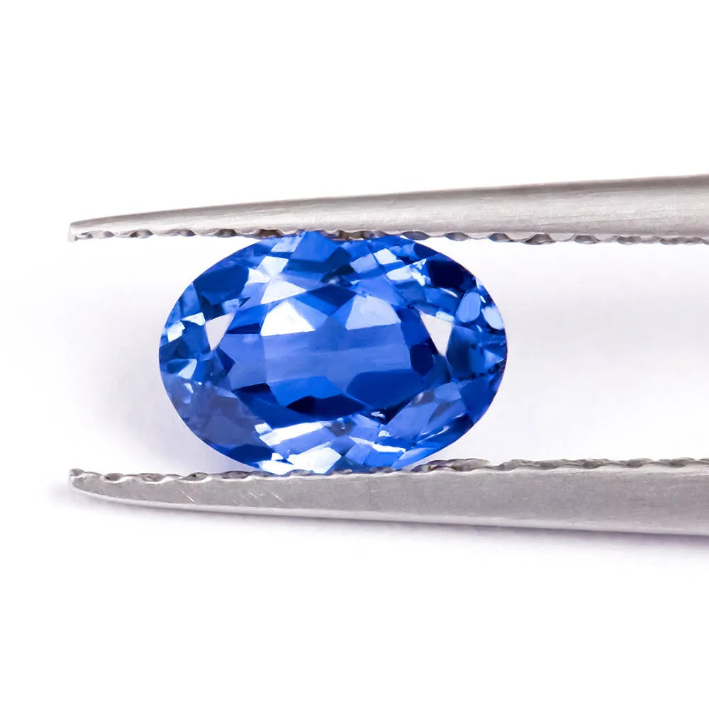 Royal blue love shaped tiara cultivate gemstone in heart and round cuts for jewellery making.