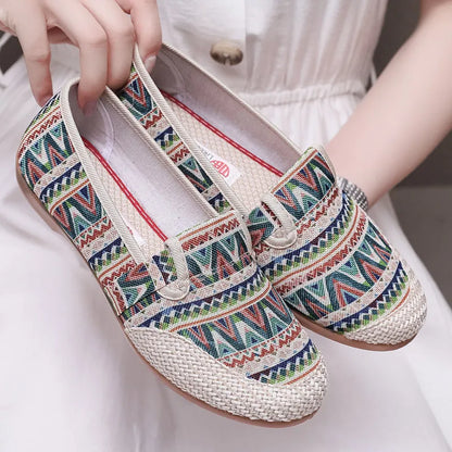 Women's ethnic style cloth shoes with shallow mouth design, colour stitching, and flat heel