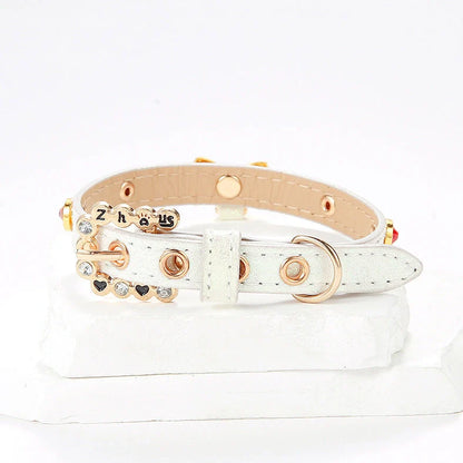 White cat collar with silver diamond alloy bow showing four size options from 26cm to 38cm length