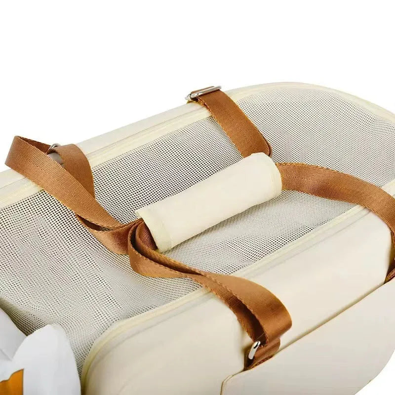 Beige hard-sided pet carrier with one-shoulder strap for cats and pets under 15kg