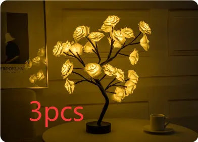 White and red rose flower LED lamp on a bonsai tree stand with warm white lights.