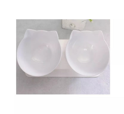 Double bowl cat food bowl with 15° tilt for cervical protection, transparent design with cute cat face