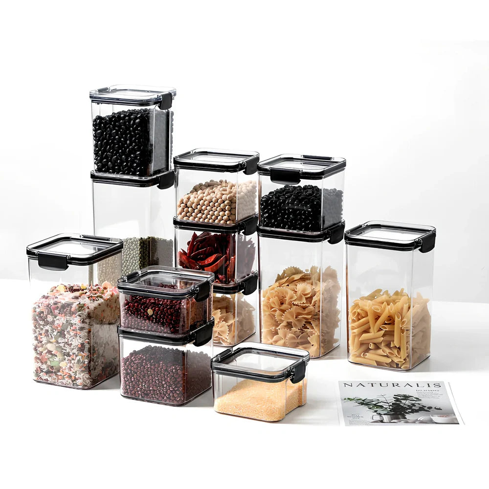 Eight transparent airtight plastic food containers in four different sizes with red sealing lids