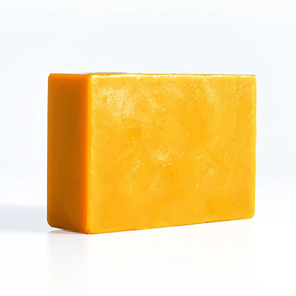 Natural Turmeric Kojic Soap for brightening and moisturizing skin, handmade with natural ingredients.