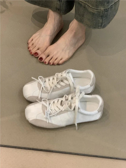 Women's white sneakers with decorative bow and round toe design in beige colour option