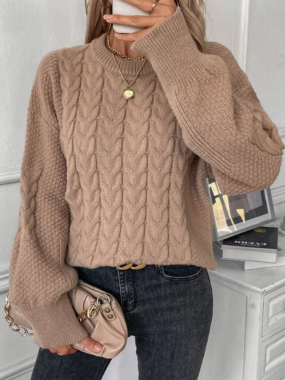 Women's round neck sweater with twist design in solid colour polyester fabric