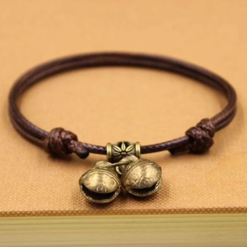 Adjustable nylon rope dog collar with brass bell in black, red, and coffee colour options