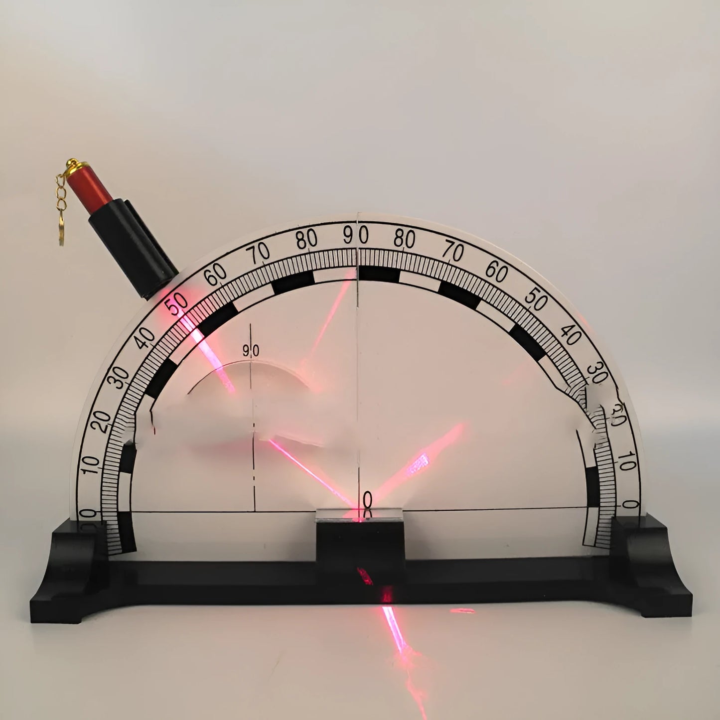 Iron plate optical physics teaching instrument with a laser pen for classroom demonstrations.