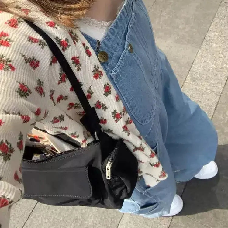 Black PU women's shoulder bag with two pockets and side line detailing, showing dimensions of 24cm length