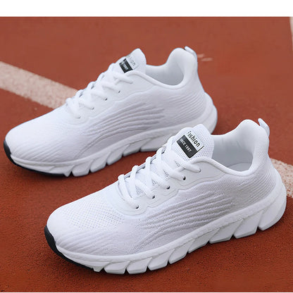 Women's black running sneakers with MD soles and cross strap detailing for jogging