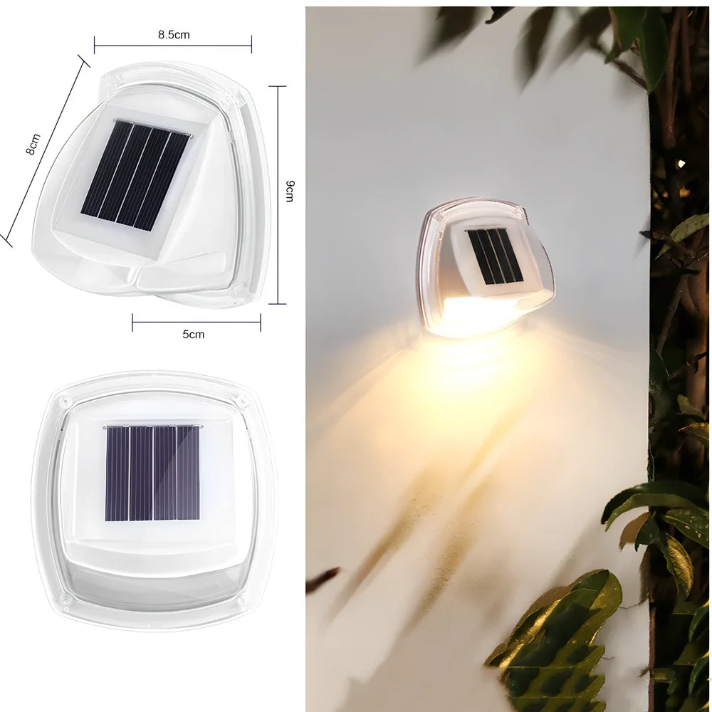 Solar garden wall lamp with waterproof housing mounted on brick wall