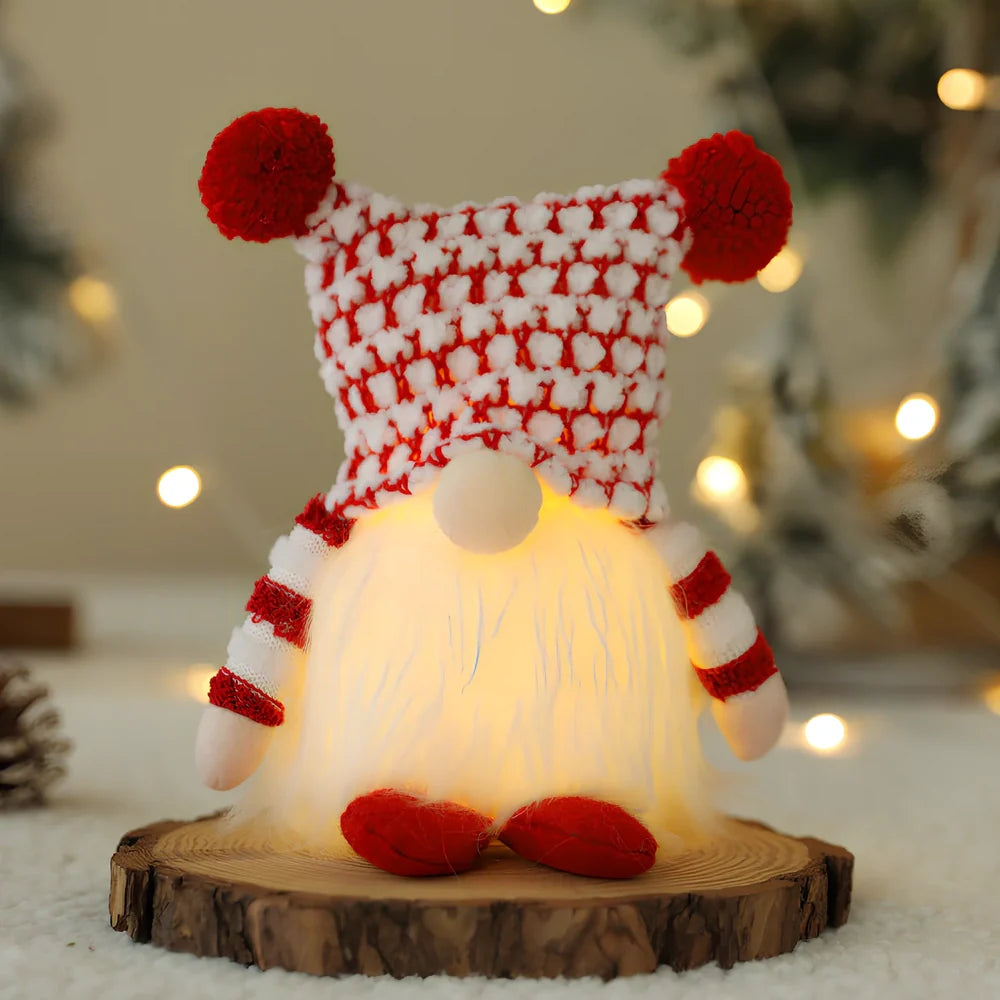 Christmas faceless doll with illuminated cap balls measuring 21cm tall, battery operated for holiday displays