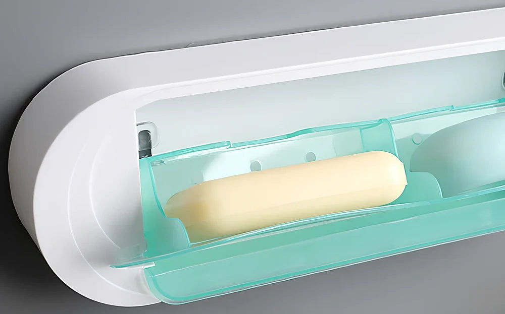 Green and white ABS plastic soap box measuring 11x5.5x33cm with drainage holes and lid