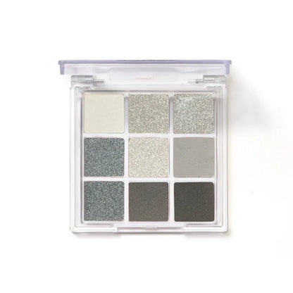 CZ0069 nine-colour smokey eyeshadow palette showing white, silver, black, and iron grey shades.