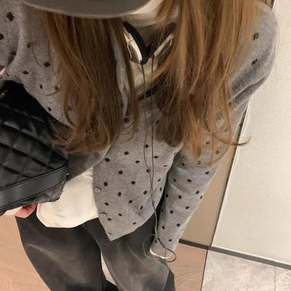 Women's gray dot knitted cardigan with viscose fabric, long sleeves, and crocheted flower details