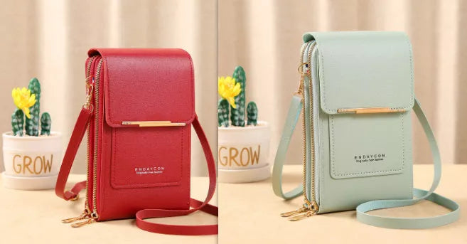 Women's messenger touch screen phone bag in solid colors with diamond decorative elements